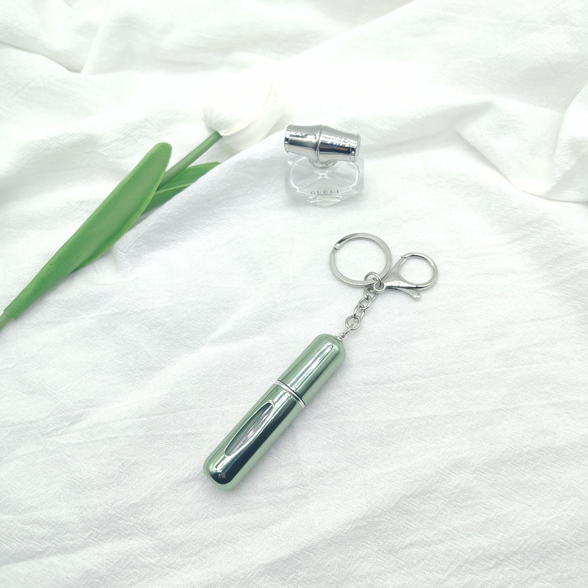 Wholesale bottom filling pump 5ml high color value sample key chain perfume bottle